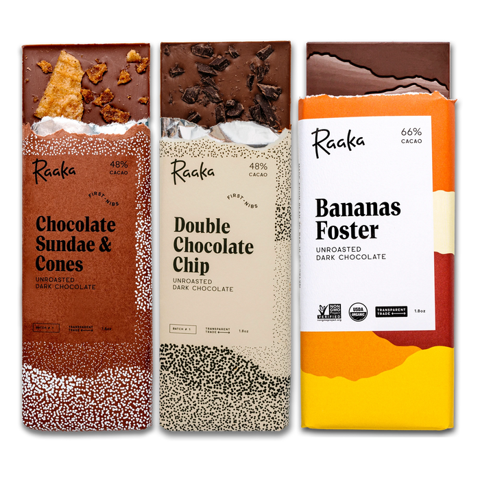 Three Raaka chocolate bars shown side by side on a white background: Chocolate Sundae & Cones, Double Chocolate Chip, and Bananas Foster.