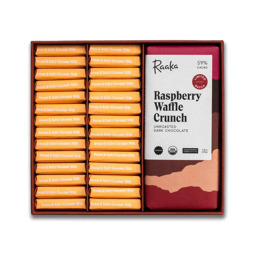 Hyrbid Box of Raaka Raspberry Waffle Crunch dark chocolate bars and Sweet and Salty minis with a visible label.