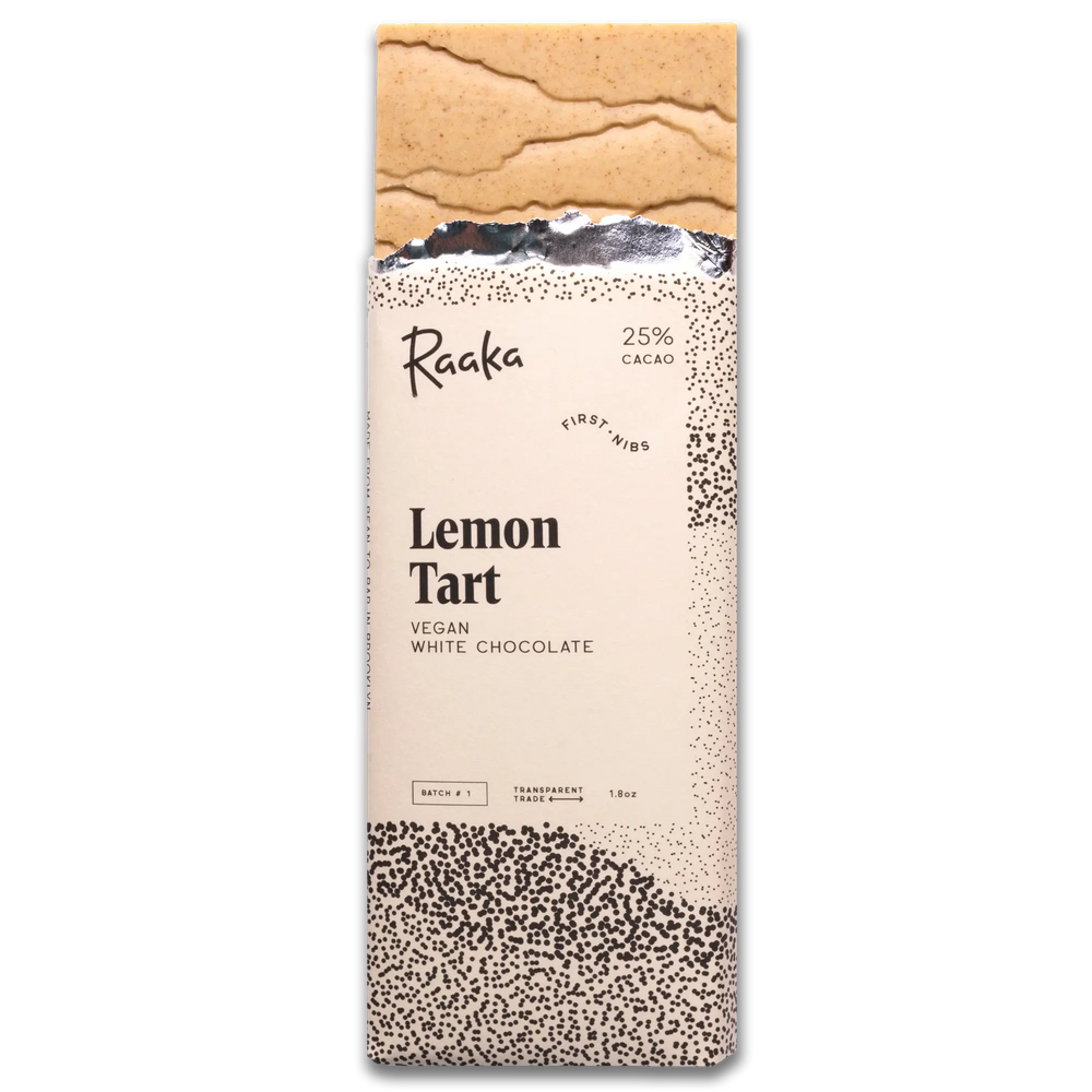 Vegan white chocolate bar with lemon tart flavor from Raaka on a white background