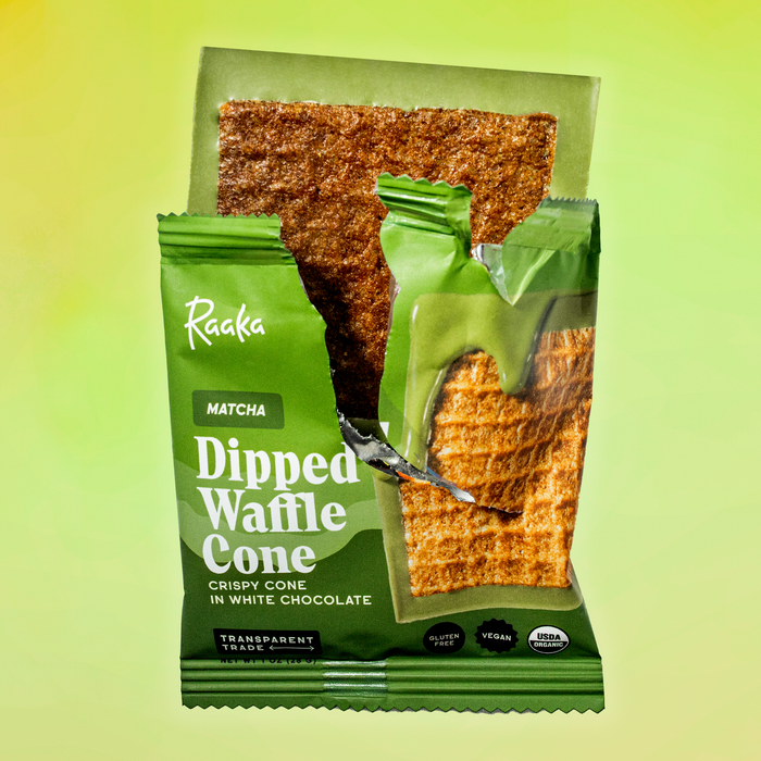 Dipped Matcha Waffle Cone bar coming out of wrapper.