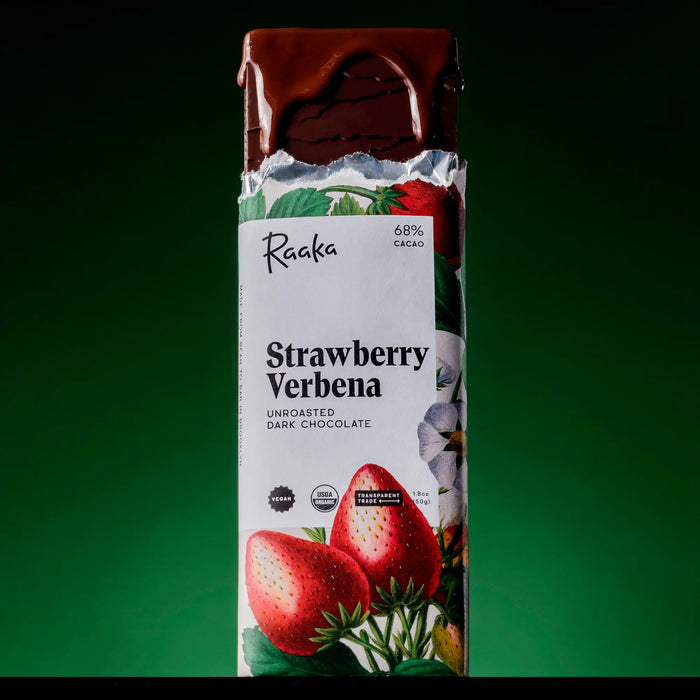 Raaka Strawberry Verbena dark chocolate bar packaging on a green background